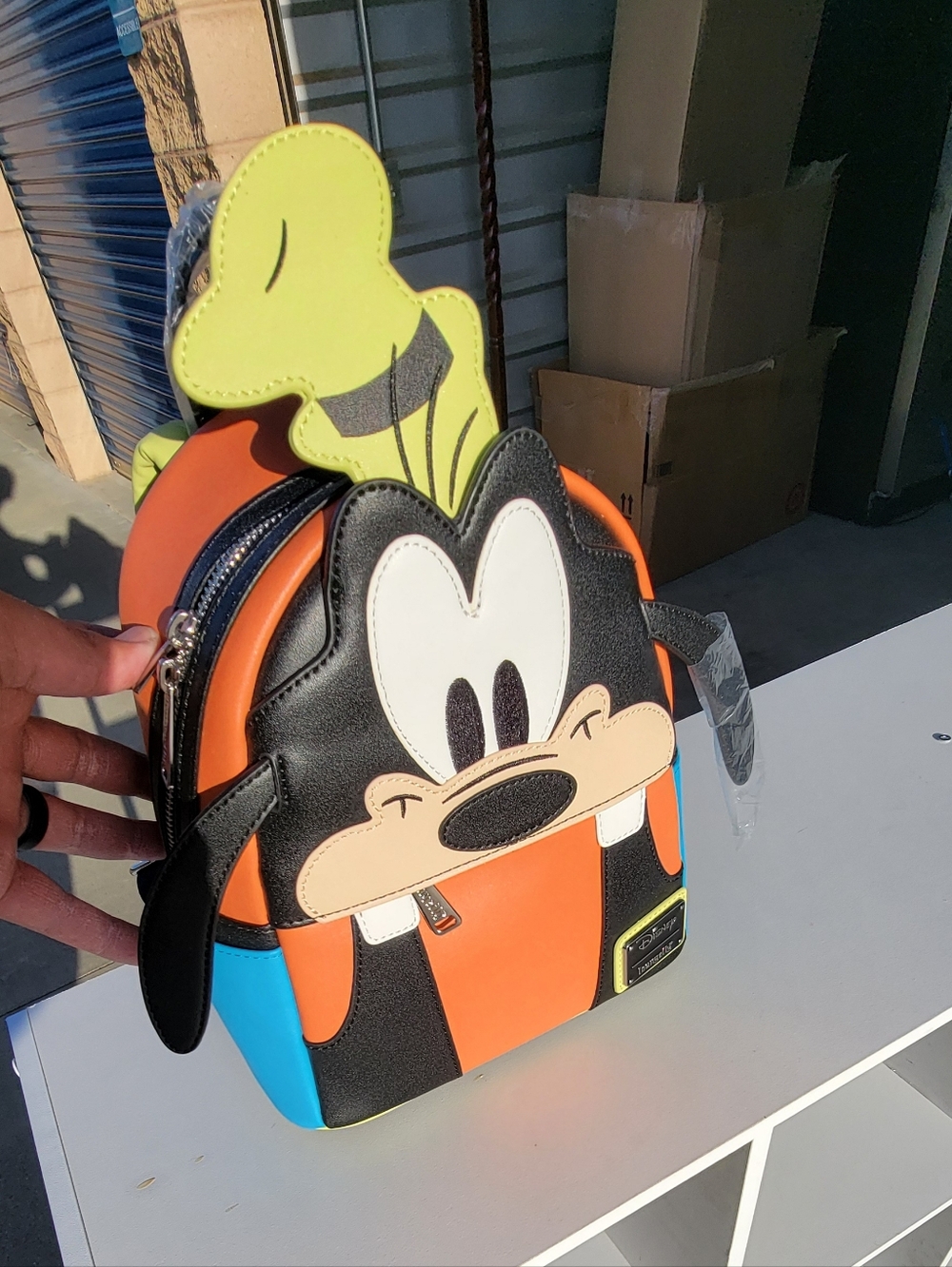 Loungefly Goofy Mini Backpack in Orange, Black, Blue, Yellow